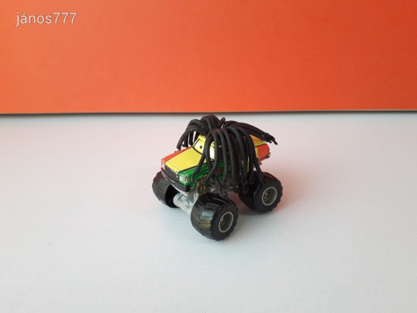 Eredeti Disney Cars Toon Deluxe Verdák szereplő Villám barátja Rasta Carian fém kisautó 7,5cm